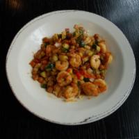 Ginger Soy Shrimp Bowl · Shrimp sautéed in a ginger soy topped with cucumber, carrot, crunchy garbanzo beans, onion a...