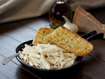 Penne Pasta · Penne pasta with sauce only. Choose: red, Alfredo or Rosa sauce (a mixture of red and Alfredo). Served with ciabatta toast.