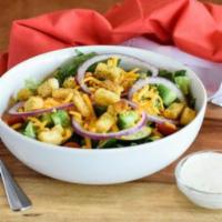 Garden Salad · Cucumber, tomato, green pepper, red onion, broccoli, cheddar, and croutons. Dressing of choi...