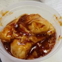 8 Piece Szechwan Dumplings · Homemade chicken dumplings in a House savory spicy brown sauce. 
