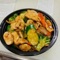 Hunan Chicken · Sliced chicken breast with fresh veggies in a brown sauce. Served with small white rice. Spi...