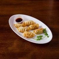 6 Piece Fried Chicken Dumpling · Contains wheat,egg,soy