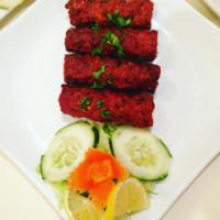 Seekh Kebab · Lamb. Ground lamb marinade with ginger, garlic, fresh mint, jalapeno.