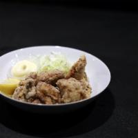 Karaage · Crispy, deep-fried breaded chicken, served with a special savory sauce. 