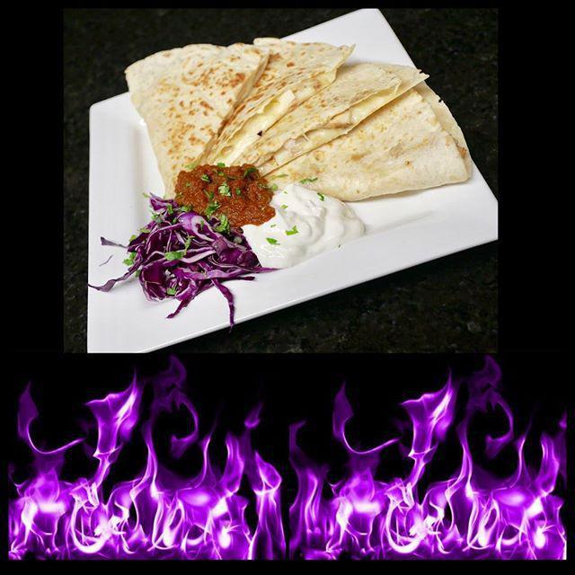 Chicken Quesadilla and Season Tortilla Chips · Flour tortilla with chicken, melted Monterery Jack and signature sauce served with sour cream.