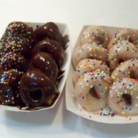 4 Mini Donuts · Chocolate, Vanilla, Powdered Sugar, Cinnamon & Sugar, Plain