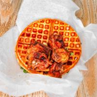 Chicken and Waffles · 5 fried chicken wings on a golden brown waffle.
