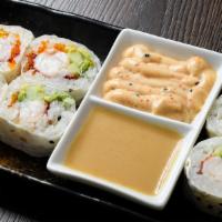 Kenny's Lobster Roll · Fresh Maine lobster rolled in soy paper, avocado, cucumber and tobiko. Served with spicy may...