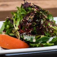 Wakame Salad · Organic baby greens with wakame seaweed tossed with creamy sesame dressing. Vegetarian.