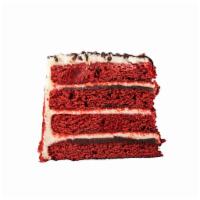 Red Velvet Cake · Vibrant red velvet cake layers, stacked four high filled with chocolate truffle and frosted ...