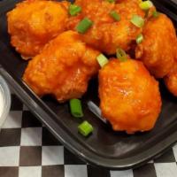 Buffalo Cauliflower · Our Buffalo Cauliflower is breaded cauliflower, freshly fried, and tossed in our spicy buffa...