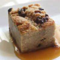 Rum Raisin Bread Pudding · Homemade bread pudding made from scratch with Jamaican rum and caramel creme sauce drizzled ...