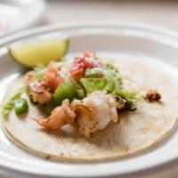 Shrimp Taco · Grilled peppers and onions.