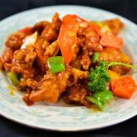 Sweet and Sour Chicken · Lightly battered chicken with pineapple, onions and bell peppers tossed in sweet and sour sa...