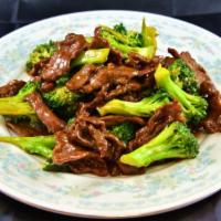 Beef with Broccoli · Stir fried beef and fresh broccoli in a ginger soy sauce. Served with steamed rice.