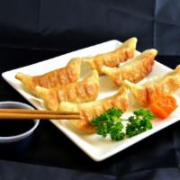 6 Pieces Pot Sticker · Savory filling wrapped in a thin dough wrapper into a dumpling and fried.