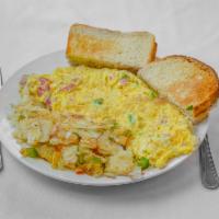 Western Omelette · 3 eggs, ham, peppers, onion, mushrooms, and American cheese.