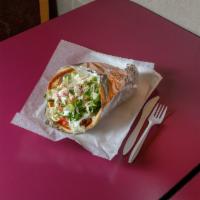 Chicken Gyro · Chicken gyro served on a pita bread with lettuce tomatoes and cucumbers and your choice of s...