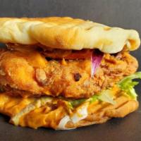 TMG Crispy Chicken Sandwich Meal · A traditional style fresh breaded Sandwich on our freshly baked Potato Pita bun. The pita is...