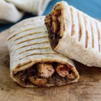 Musakhan Snack Wrap · Chicken, caramelized onions, sumac, and olive oil rolled in a wrap.