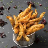 Crispy Zaatar Fries · Our deliciously crunchy fries seasoned with our house Zaatar blend. Vegan.