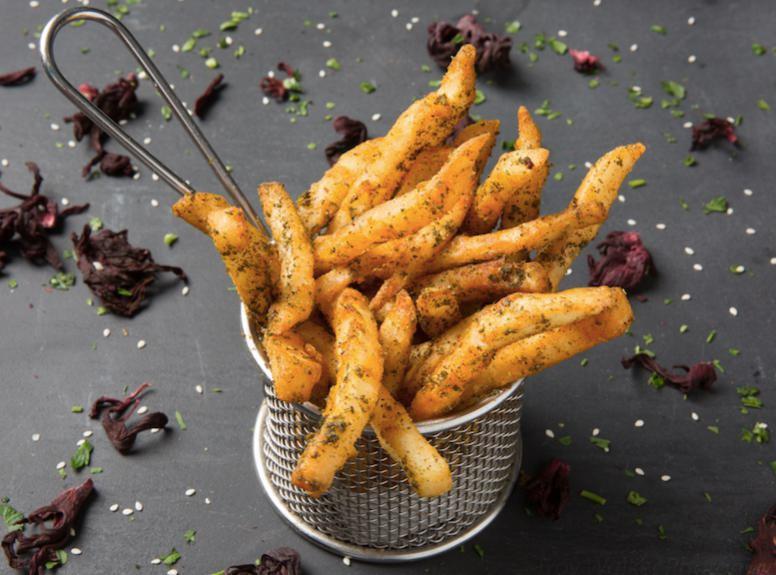 Crispy Zaatar Fries · Our deliciously crunchy fries seasoned with our house Zaatar blend. Vegan.