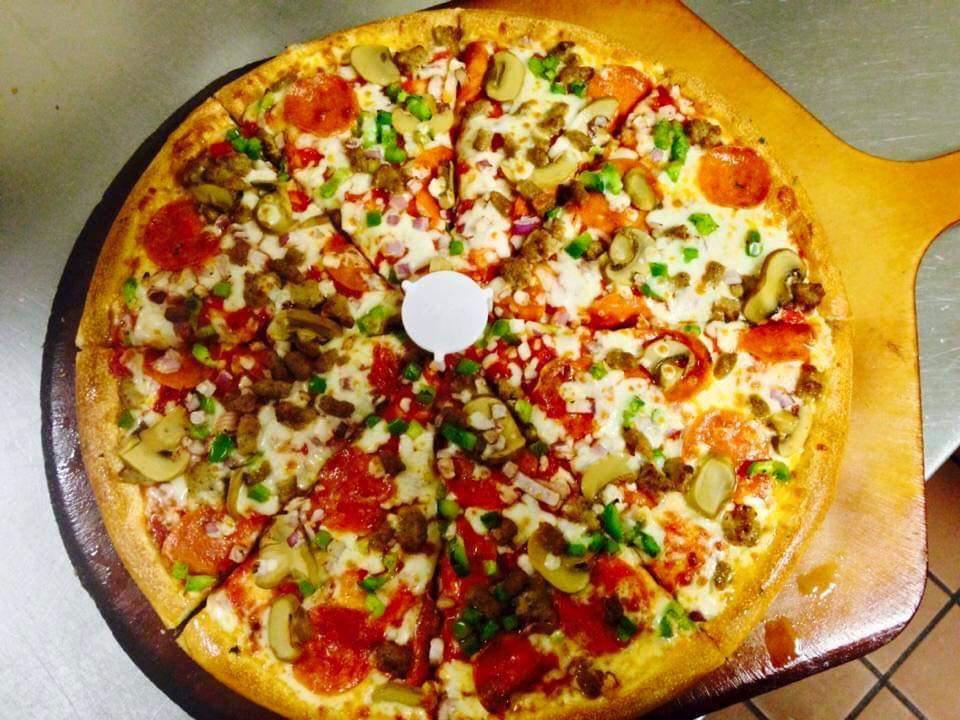 Sicily's Supreme Pizza · Pepperoni, ground beef, Italian sausage, mushrooms, green peppers, red onions and mozzarella with marinara. 