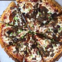 Meatball Parmesan Pizza · Meatballs, mushrooms, black olives, green peppers, fresh basil, Parmesan and mozzarella with...