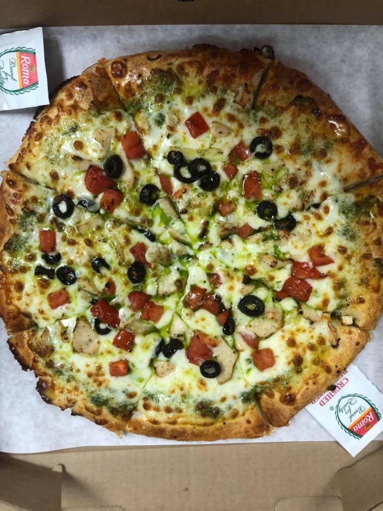 Pesto Chicken Pizza · Grilled chicken, Roma tomatoes, black olives and mozzarella with pesto sauce. 