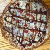 Barbeque Chicken Pizza · Grilled chicken, red onions, Roma tomatoes, fresh cilantro and mozzarella with BBQ sauce. 