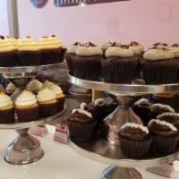 BUY 10 GET 2 FREE! · Buy 10 Fresh Baked Cupcakes get 2 FREE!
