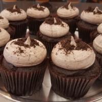 Cookies N' Cream · Chocolate cake frosted with Oreos buttercream and topped with crushed Oreos.