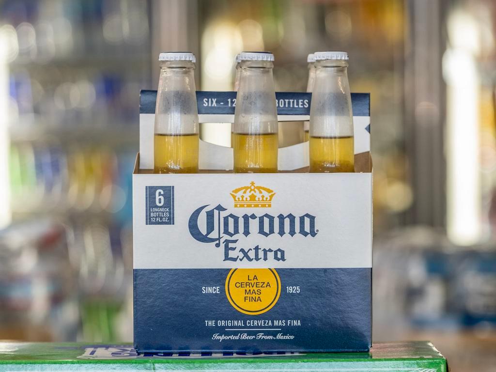 Corona - Extra · Must be 21 to purchase. 6 Pack Bottles - 12 OZ