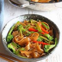 48. Vegetable Ho Fun · Stir fried rice noodle dish.