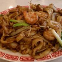 50. Shrimp Ho Fun · Stir fried rice noodle dish.