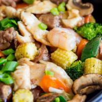H3. Happy Family · A delicious combo of squid, sliced pork, shrimp, beef, chicken and scallops. Crab meat sauté...