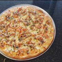 Chicken Bruschetta Pizza · Grilled chicken with fresh tomatoes, red onions, green peppers, garlic, fresh basil and roas...