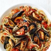 Mussel spaghetti souce · Mussel spaghetti  marrinara souce side soup o salad