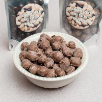 Chocolate Covered Peanuts · Double-dipped chocolate covered peanuts in Milk Chocolate