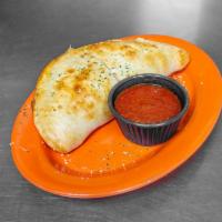 Calzone · Comes with ricotta cheese, mozzarella cheese and a side of marinara sauce.