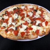Margherita Pizza · Toppings- Olive oil as the sauce/Roma tomatoes/Basil/Ricotta cheese/Garlic