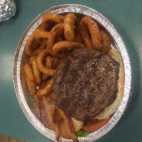 Beef Burger · 8 oz Of freshly ground 100% steer beef. Regular burgers served on a bun with coleslaw and pi...