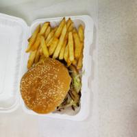 NY Burger Deluxe · Served with grilled onions, mushrooms and American cheese. Comes with fries and a can of soda.