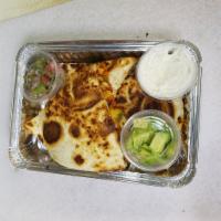 10. Quesadilla · Beef or chicken with cheese, peppers and onions, guacamole, pico de gallo and sour cream.