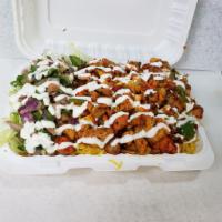 Chicken over rice  · Halal chicken .rice .lettuce. tomatoes any dressing 