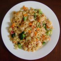 5. Seafood Combo Fried Rice · Shrimp, scallop, crabmeat, calamari with mixed vegetables in spicy sauce.