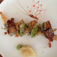 French Dragon Roll · Our shrimp tempura inside, topped with eel and avocado.