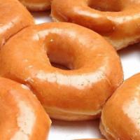 Raised (yeast) donut glazed or choc glazed · Raised donuts soft, airy, and sweet.  Glazed or chocolate topped.  Popular toppings include ...