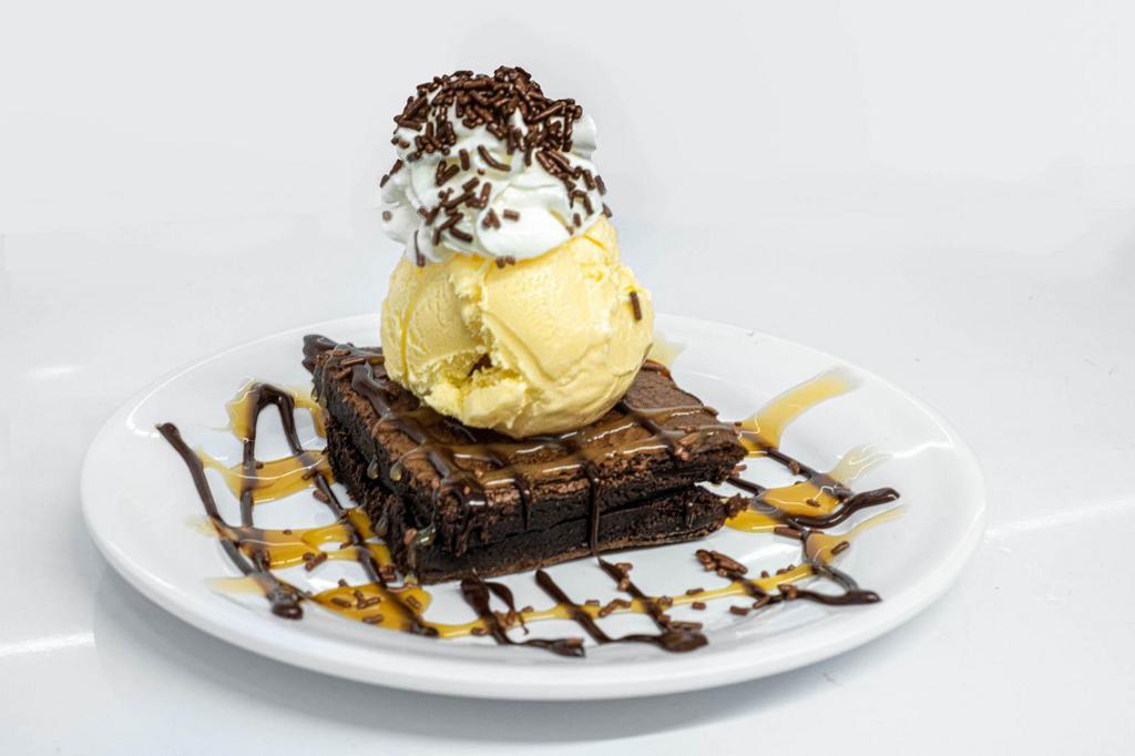2. Brownie and Ice Cream  · Brownie, Whipped Cream & ice cream. 