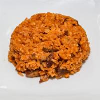 Shirley's Savory Red Rice · Contains turkey and tomato base.